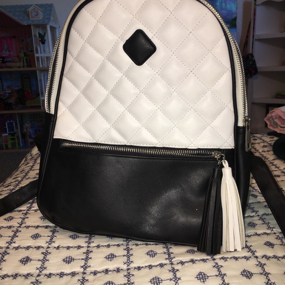 BLACK AND WHITE CLAIRES BACKPACK PURSE!!